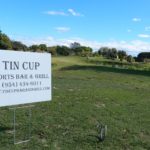 Tin Cup sponsor sign